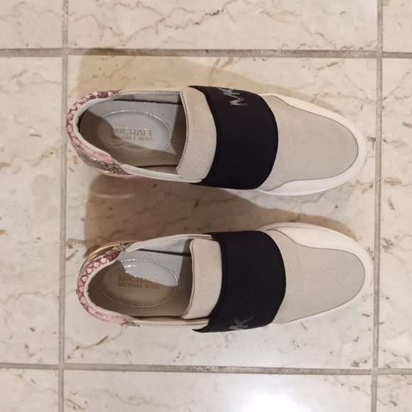 All new Michael Kors style sneakers worn one time. - Picture 2 of 4